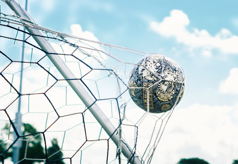 Soccer Ball going into the net
